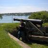 Scott keeps watch by the artillery.